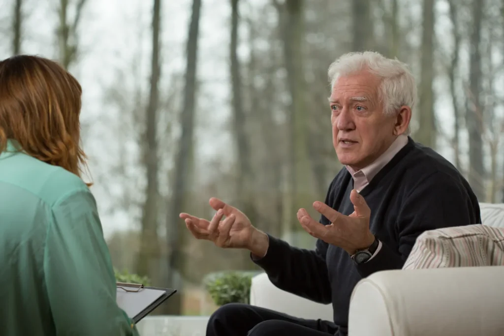 a grand father talks with there grand-child